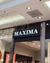 Reklama z aludibondu, litery z frezowanego pleksi.